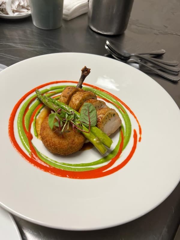 A freshly plated gourmet dish prepared on-site by a catering chef in Orlando, Florida